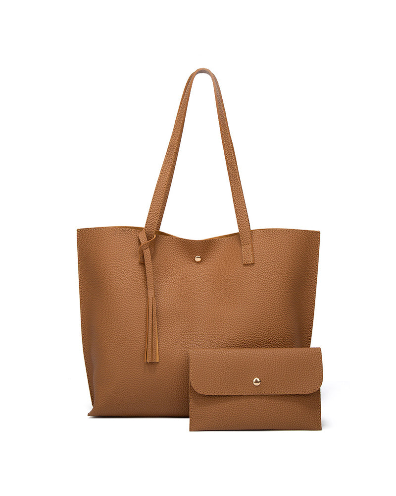 Kapacitet med enfärgad tofs axelväska med stor