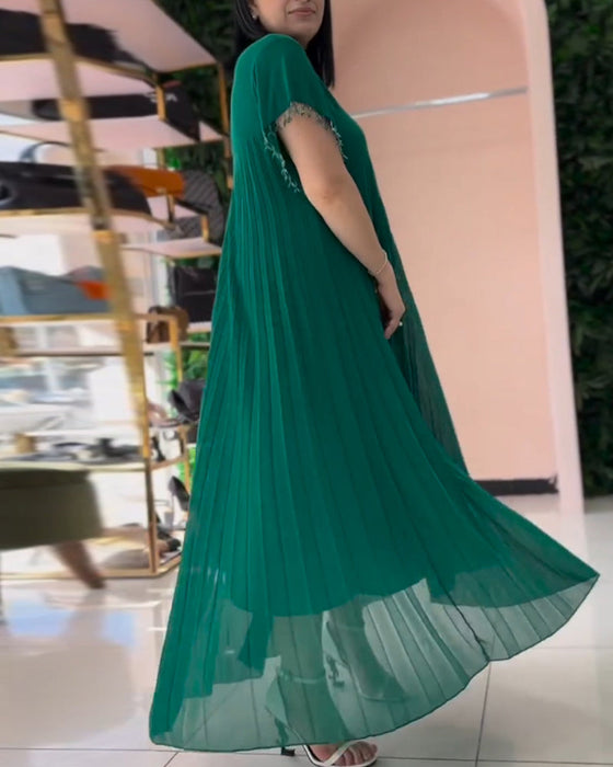 Klänning med kort ärm och veckad