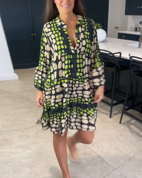 Fritidsklänning med djup v-tryck