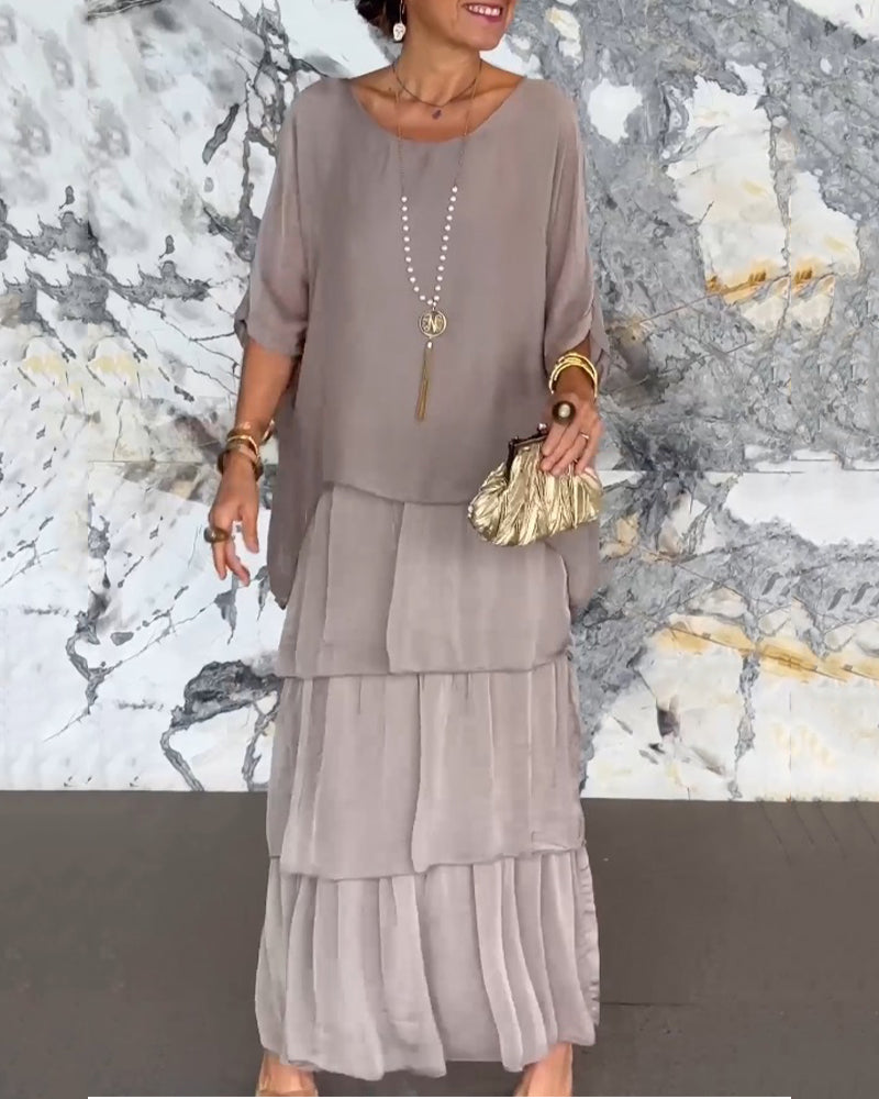 Klänning med konstnärlig stil och lös passform