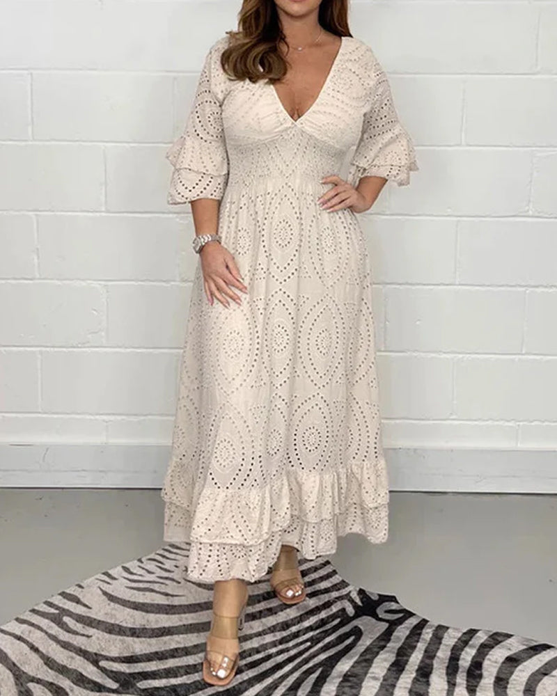 Lös v-ringad enfärgad klänning med hög midja