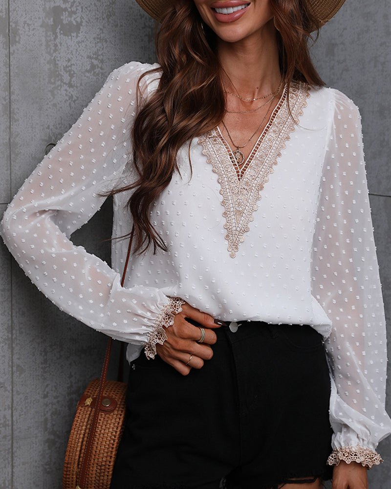 Enfärgad långärmad blusar med spets