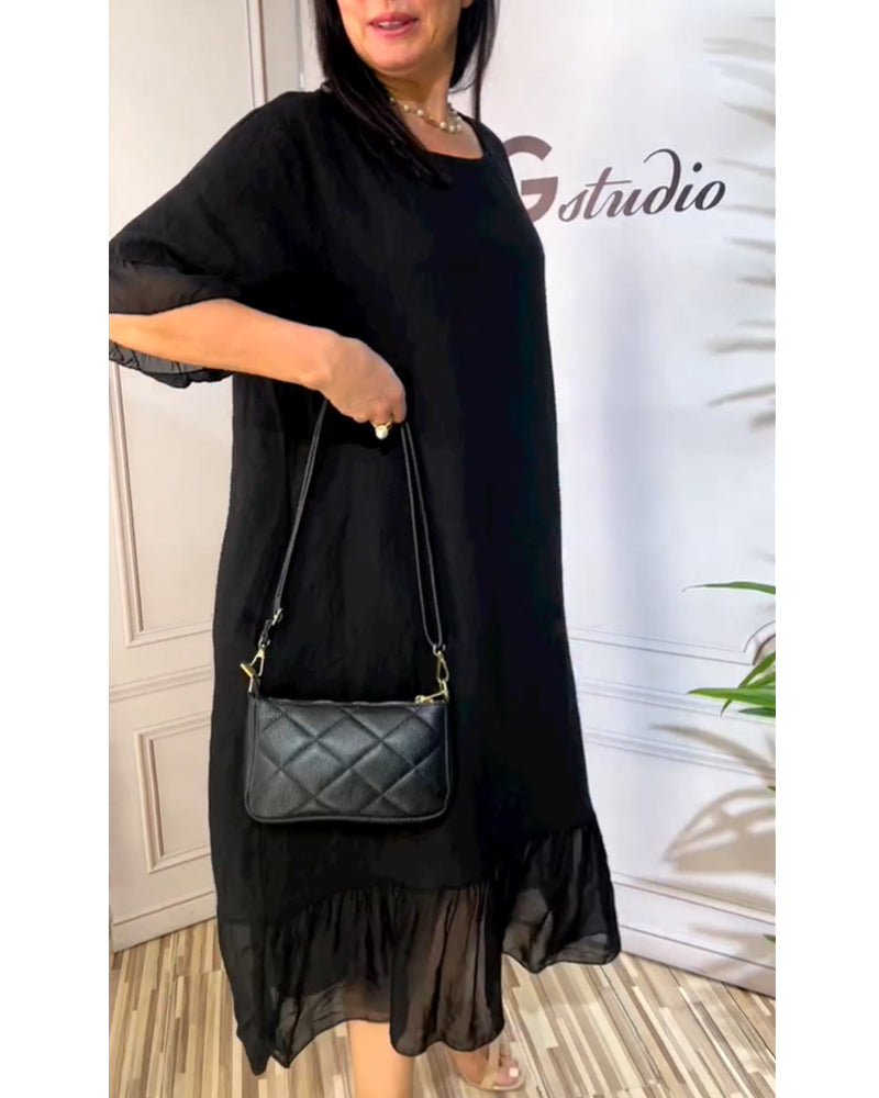 Kortärmad flödande klänning i panel