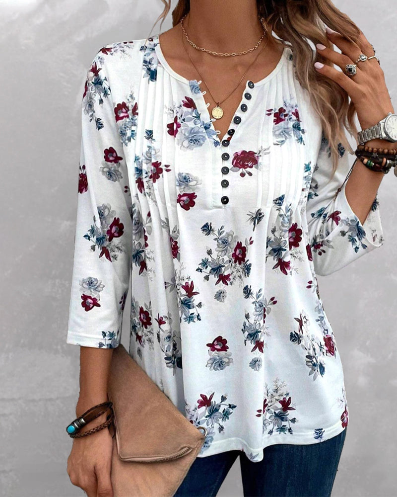 Blommig elegant blus med knappar