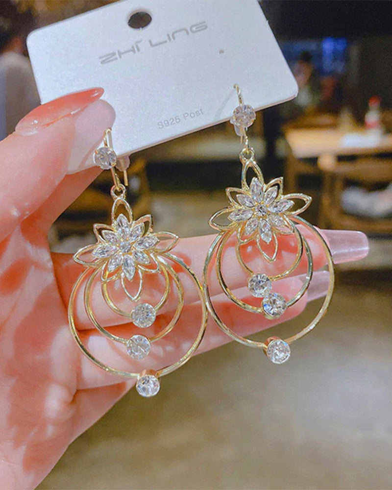 Kristalllotus örhängen med tre bågar