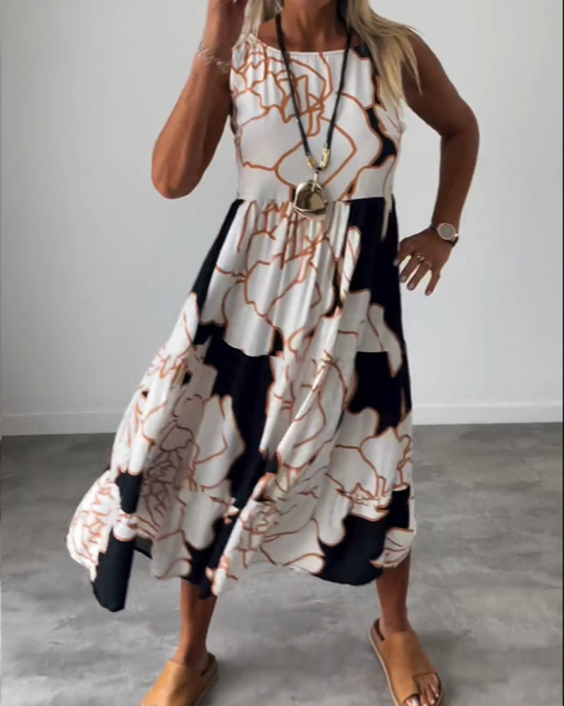 Klänning med ärmar och blommönster