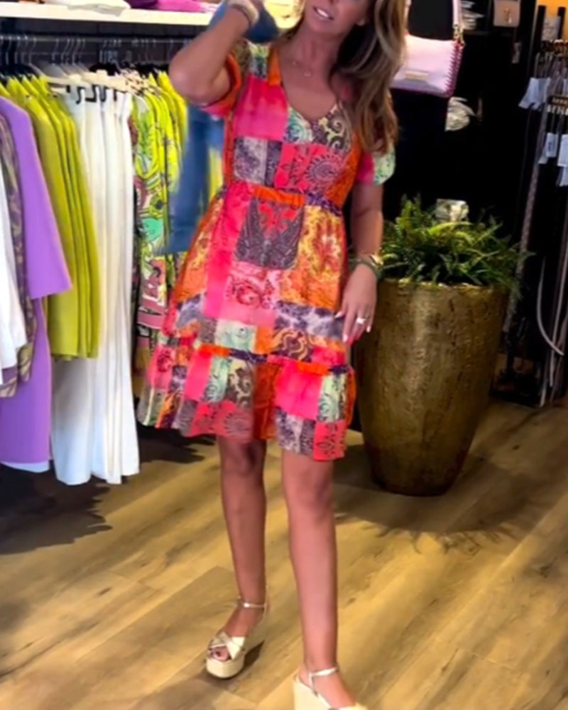 Kortärmad midiklänning med tryck