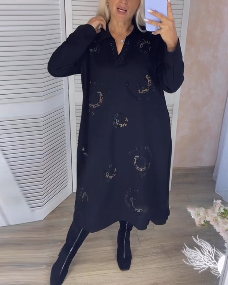 Långärmad midiklänning med slag