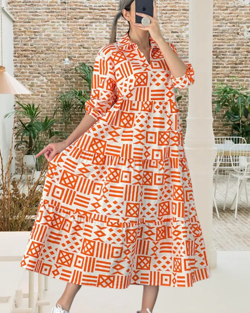 Lapelklänning i geometriskt tryck