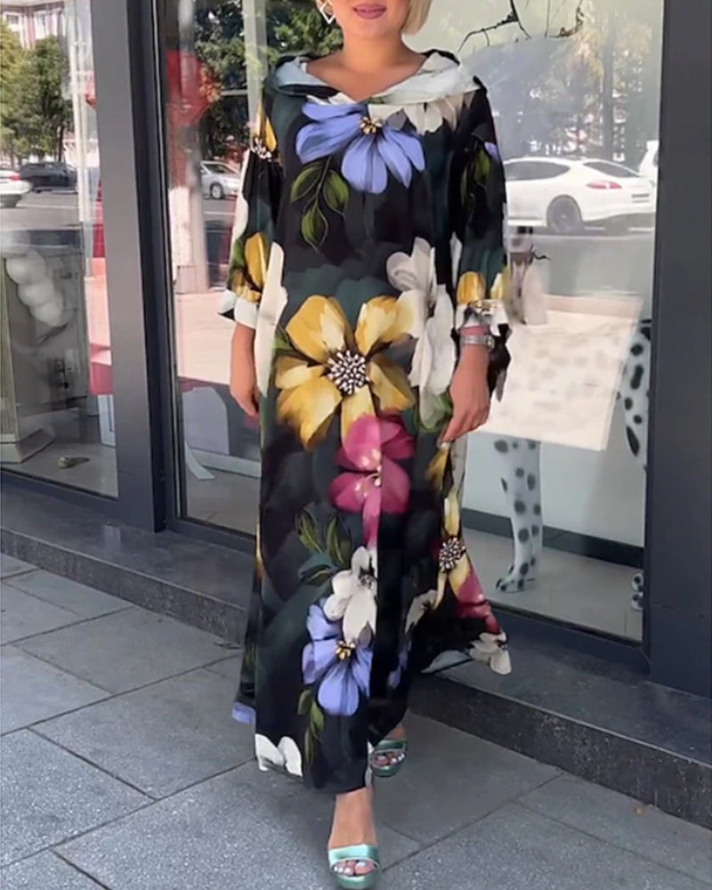Blommig klänning med 3/4-ärm