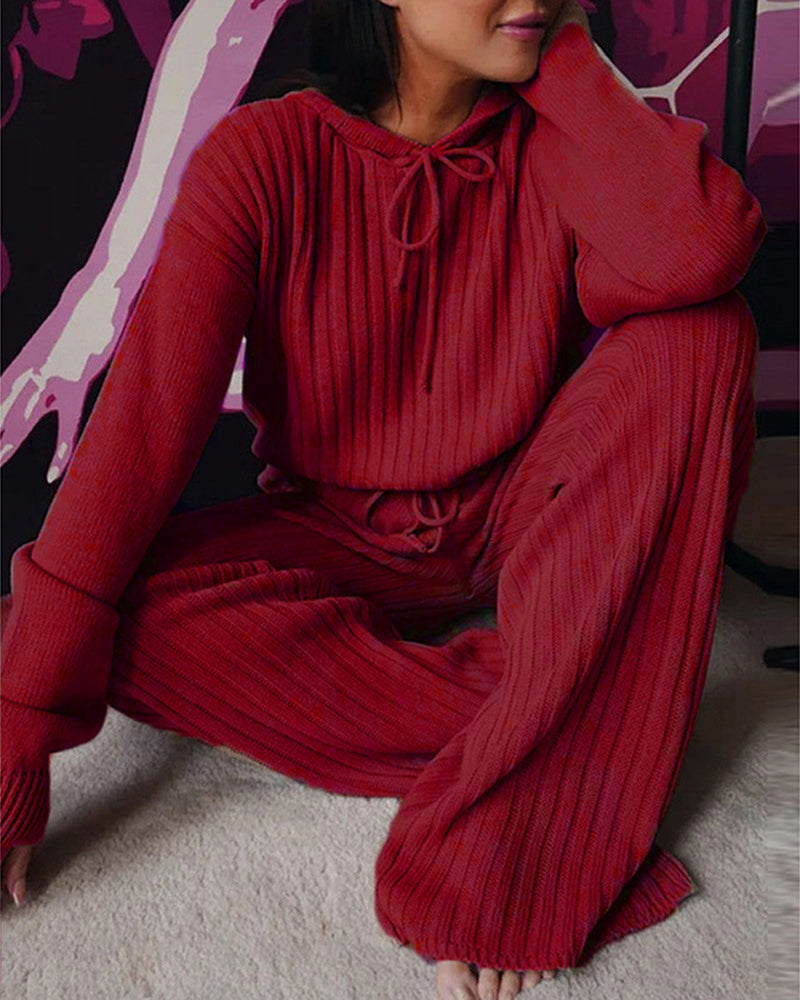 Lös långärmad kostym med huva