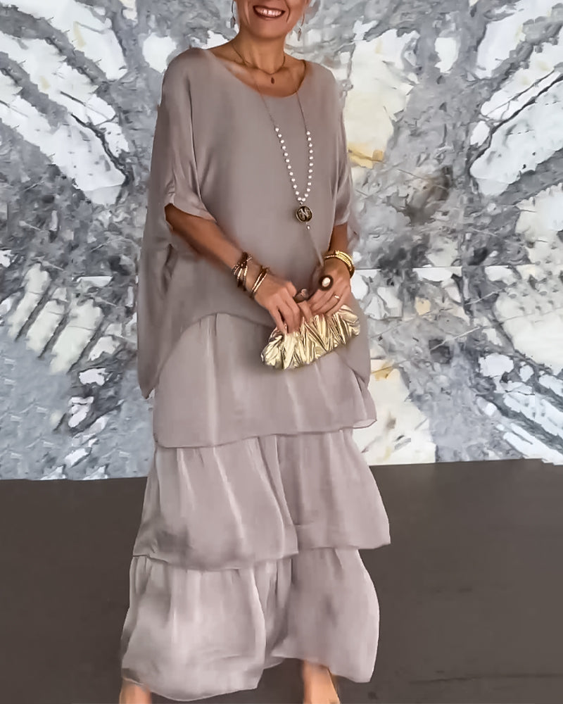 Klänning med konstnärlig stil och lös passform