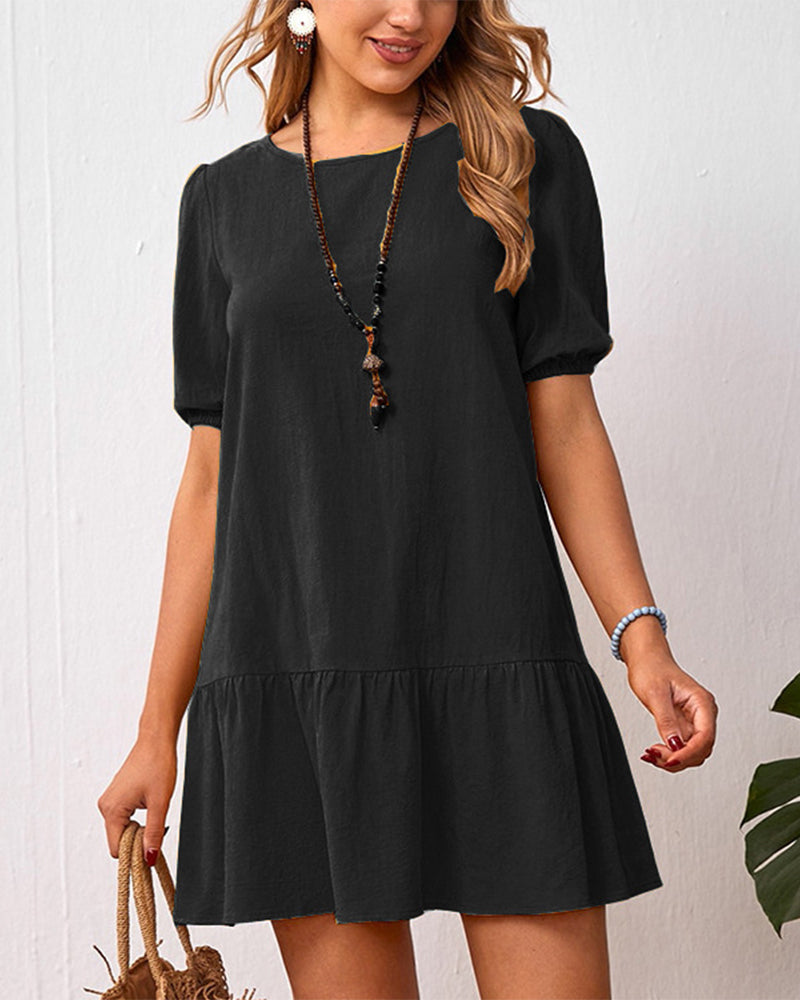 Klänning i bomullslinne med puffärmar