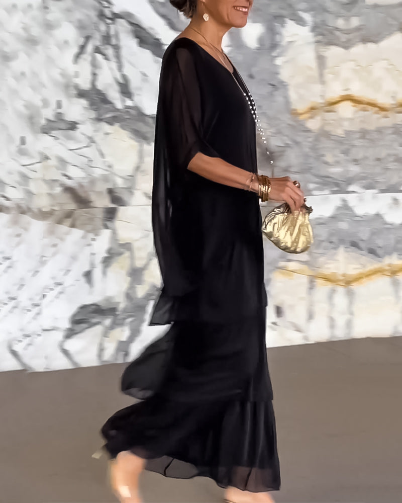 Klänning med konstnärlig stil och lös passform