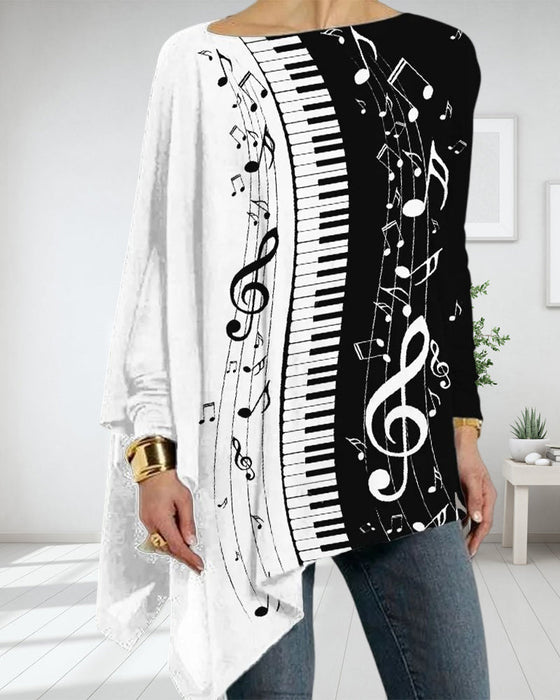 Oregelbunden långärmad topp med pianotryck