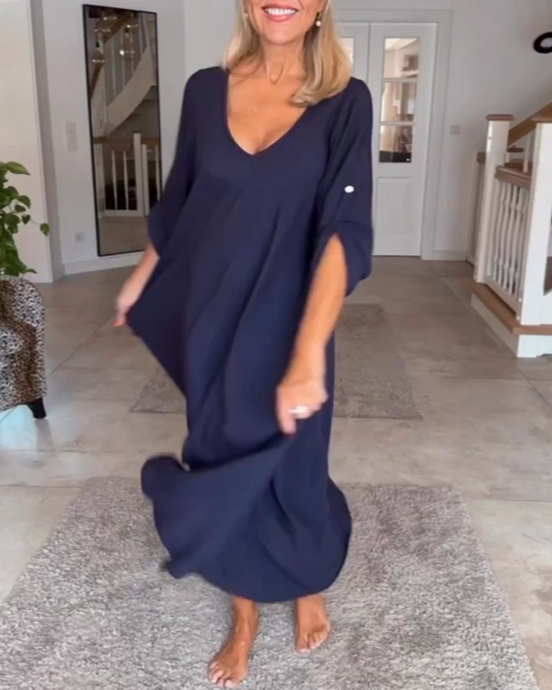 Enfärgad Klänning och v-ringad