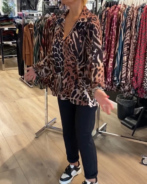 Lös topp med leopardmönster