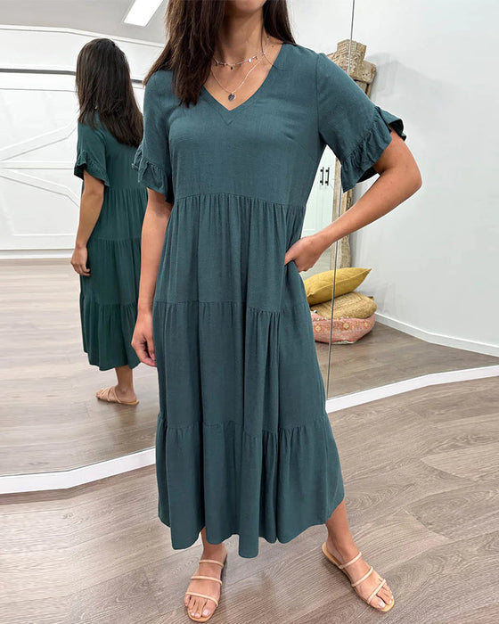 Klänning med lösa ärmar och paneler