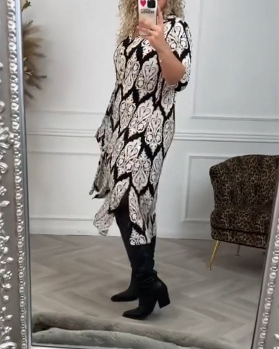 Lapelklänning med tryck i sidled