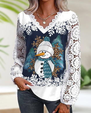 Blus med spets- och snögubbemönster