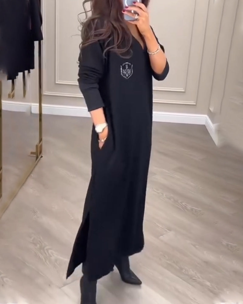 Elegant klänning med v-ringad sidosprund