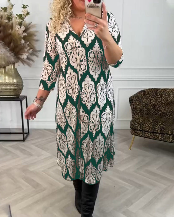 Lapelklänning med tryck i sidled