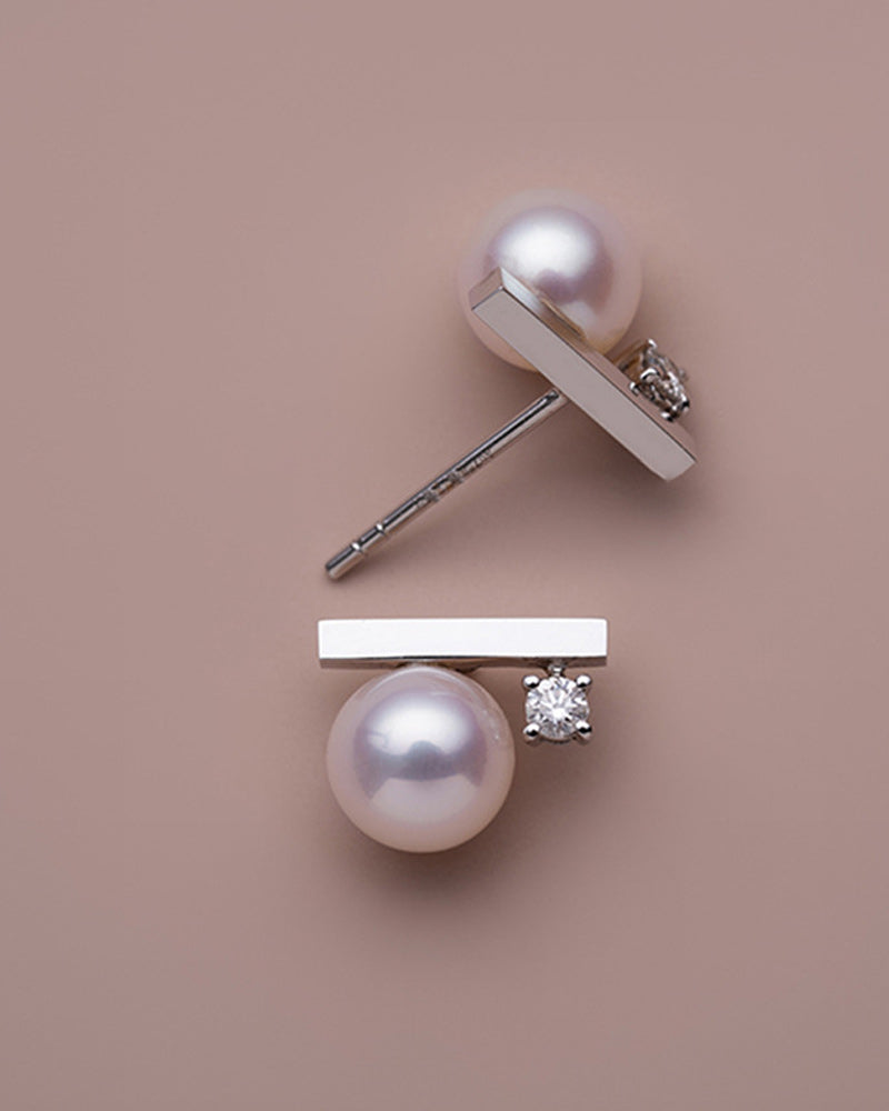 Enkla pärlörhängen och pärlhalsband