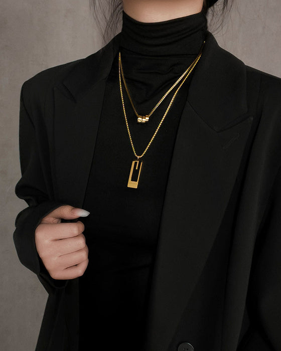 Dubbelt långt halsband i titanstål