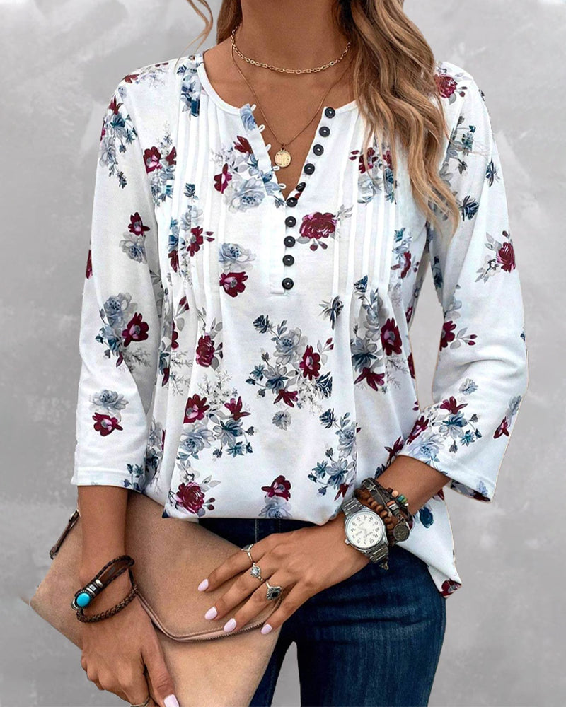 Blommig elegant blus med knappar