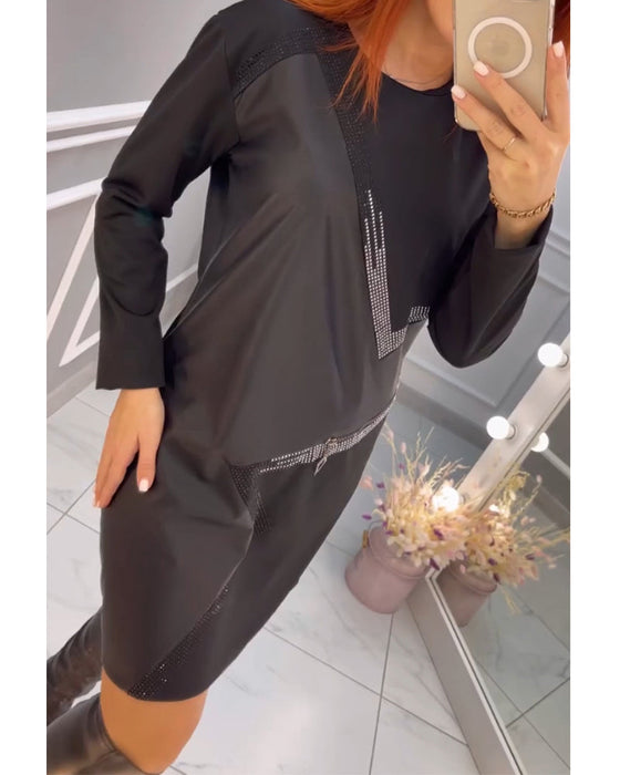 Klänning med konstnärlig touch och färgblockering