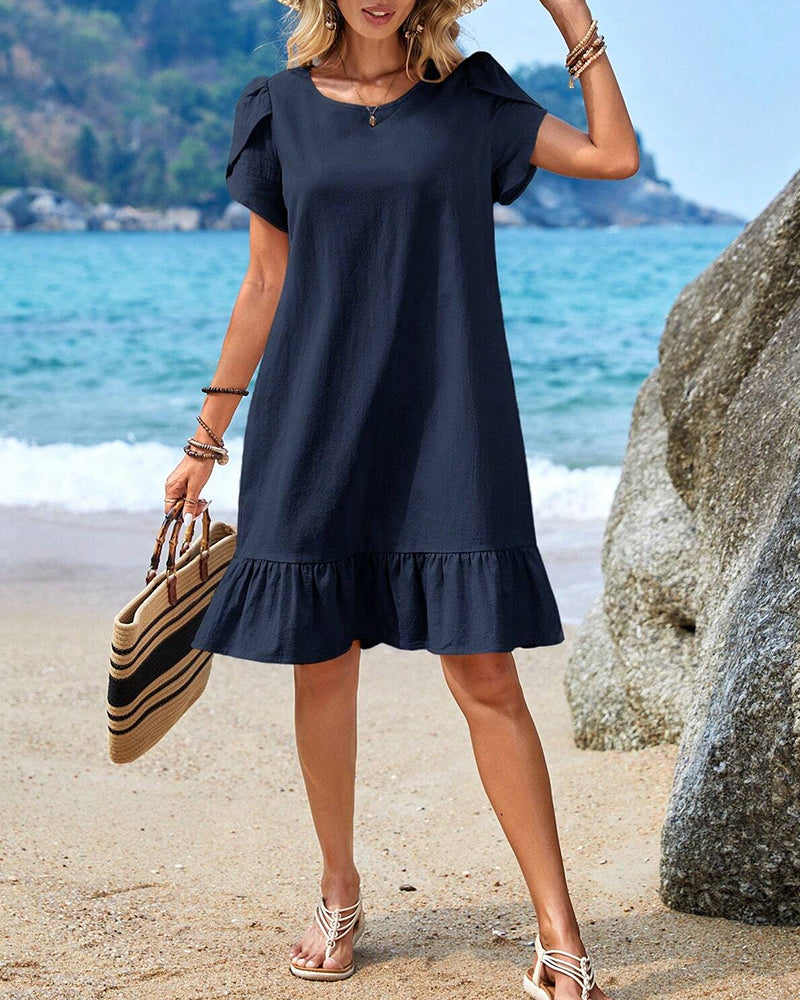 Kortärmad patchworkklänning med rund hals