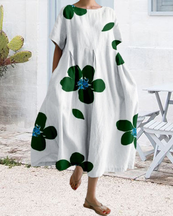 Lös kortärmad klänning med tryck