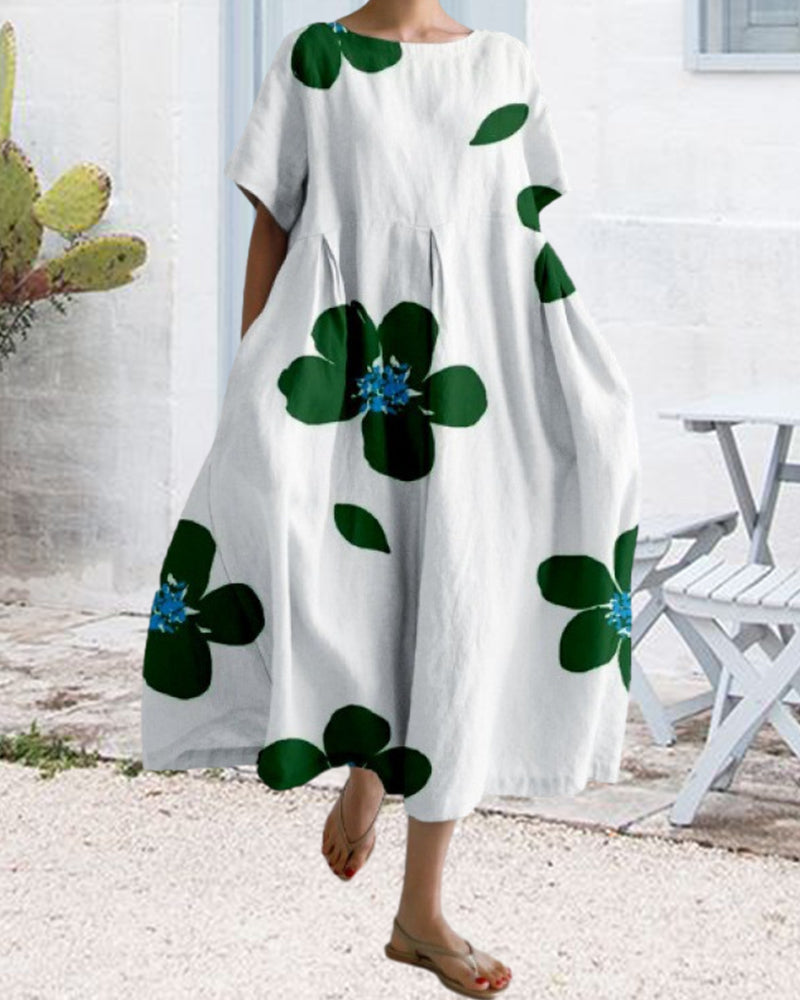 Lös kortärmad klänning med tryck