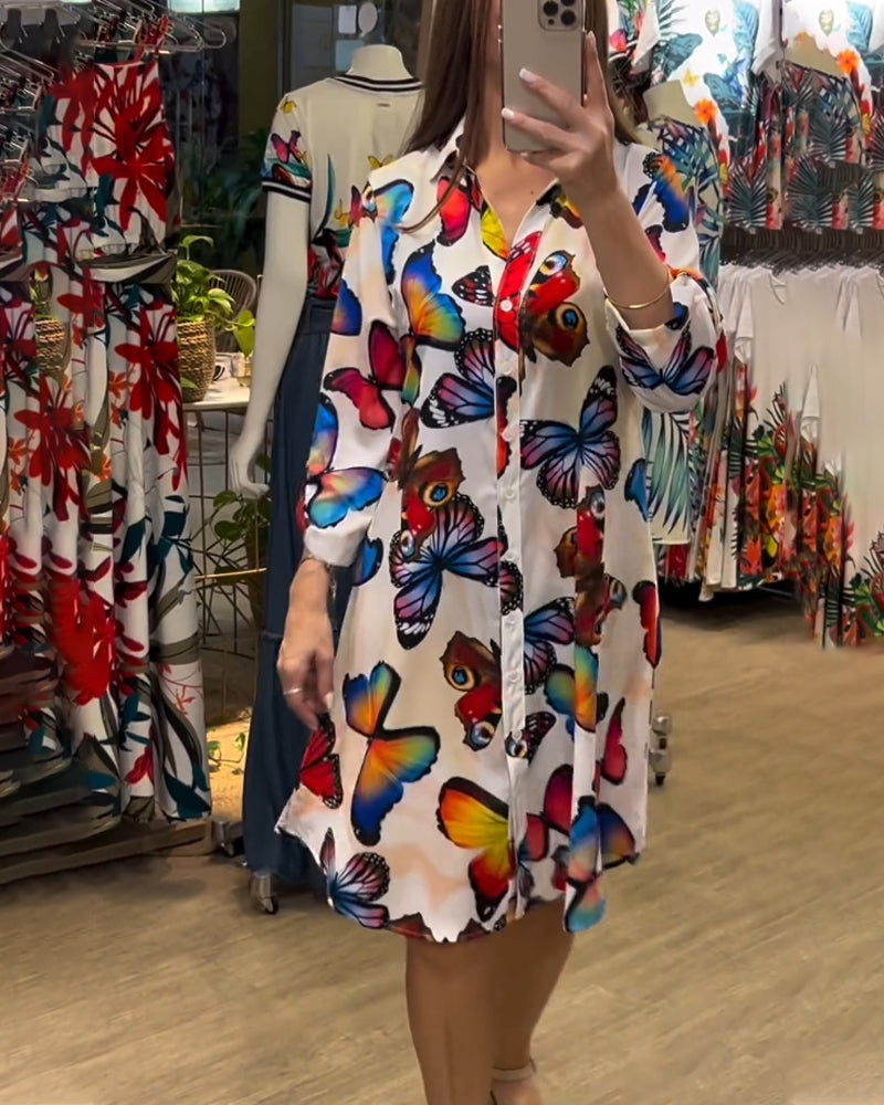 Klänning med fjärilstryck och lös passform