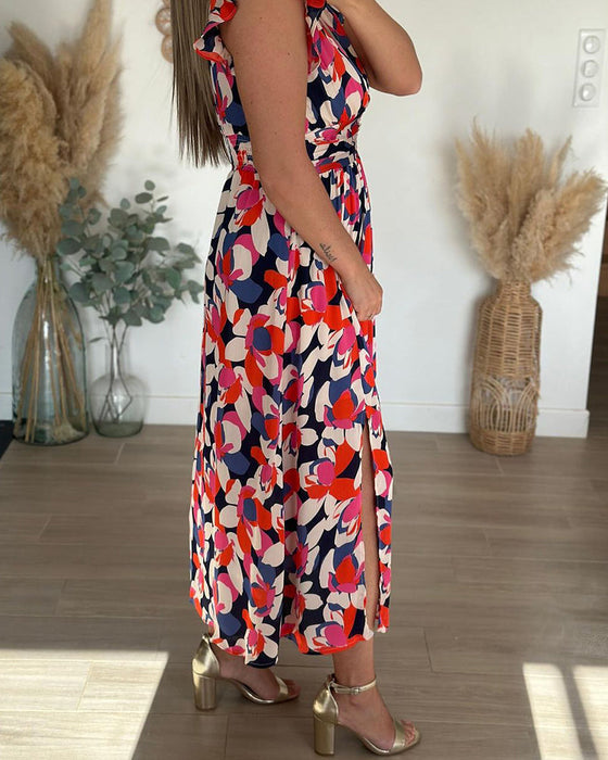 Klänning med V-ringning och ärmlös och tryckt