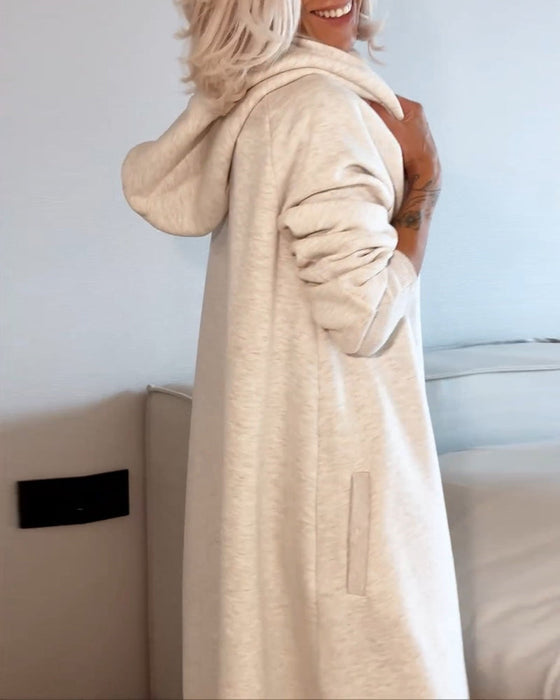 Enfärgad huvklänning med dragsnöre