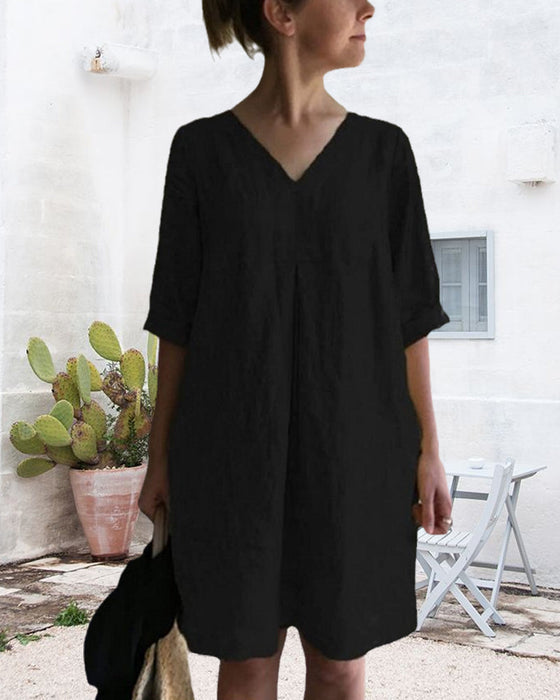 Damklänning med V-ringning och korta ärmar