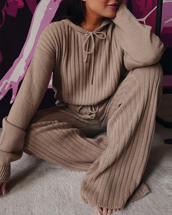 Lös långärmad kostym med huva