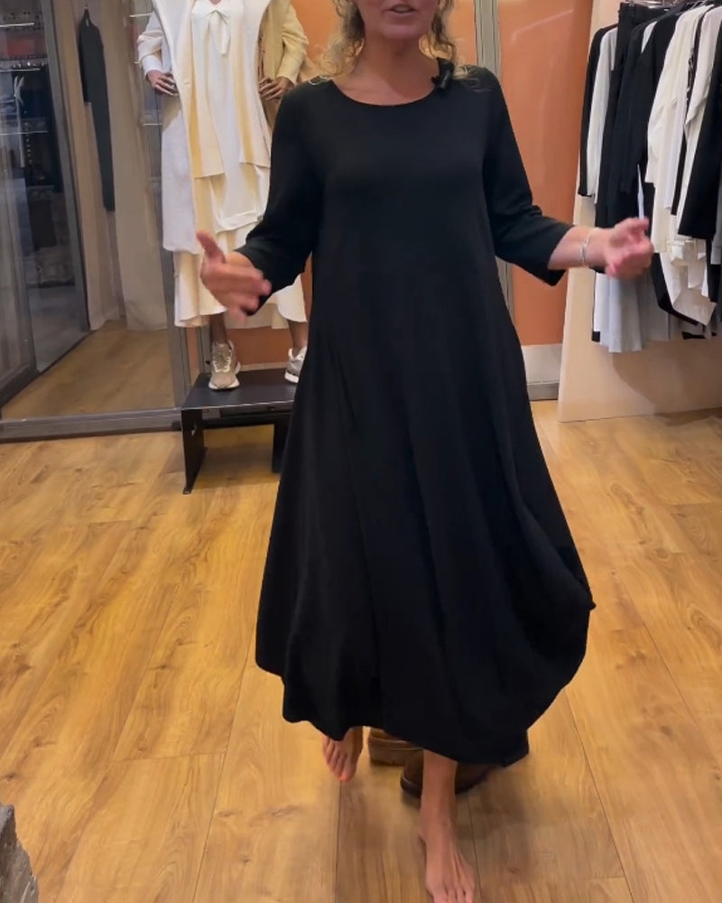 Klänning med långa ärmar och rund hals