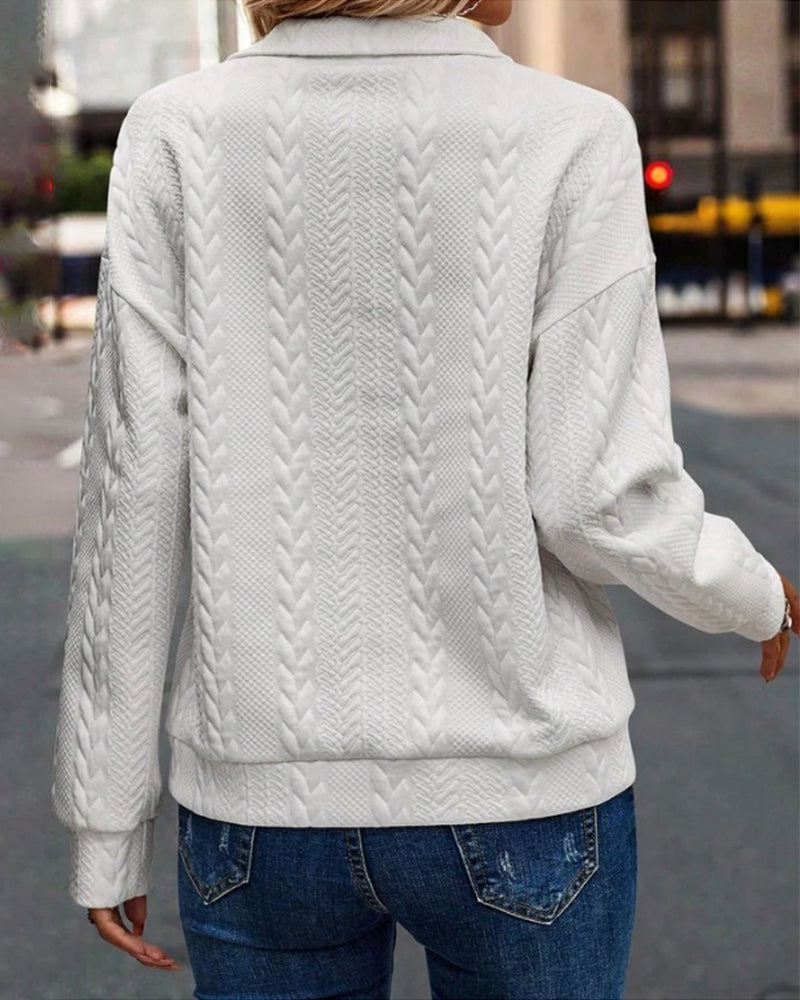 Enfärgad tröja med dragkedja