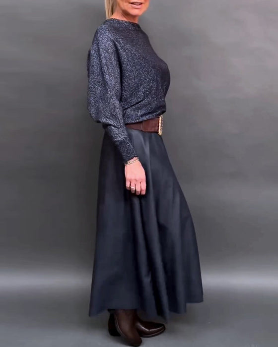 Glänsande topp med rund hals och dolmanärm