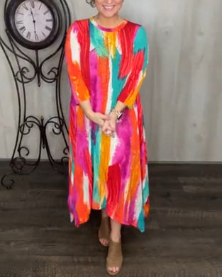 Färgglad, rund halsad ledig klänning med tryck