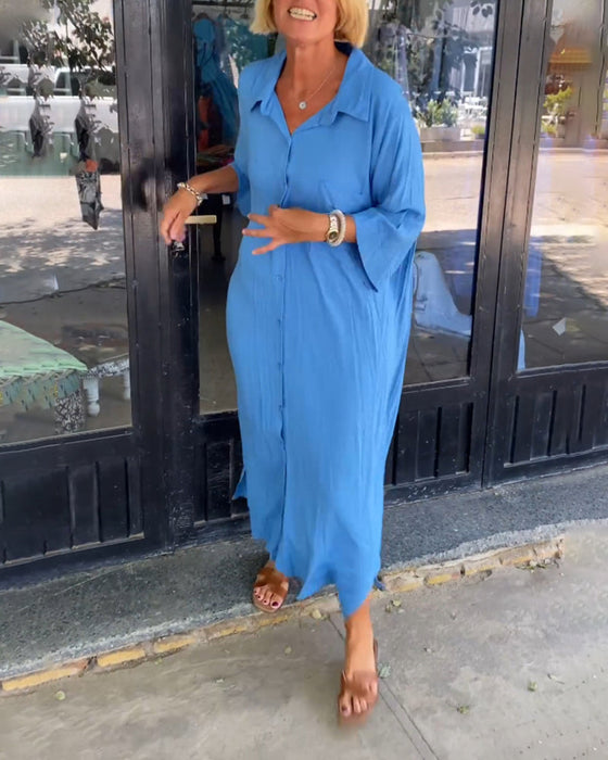 Klänning med slitsar och slag