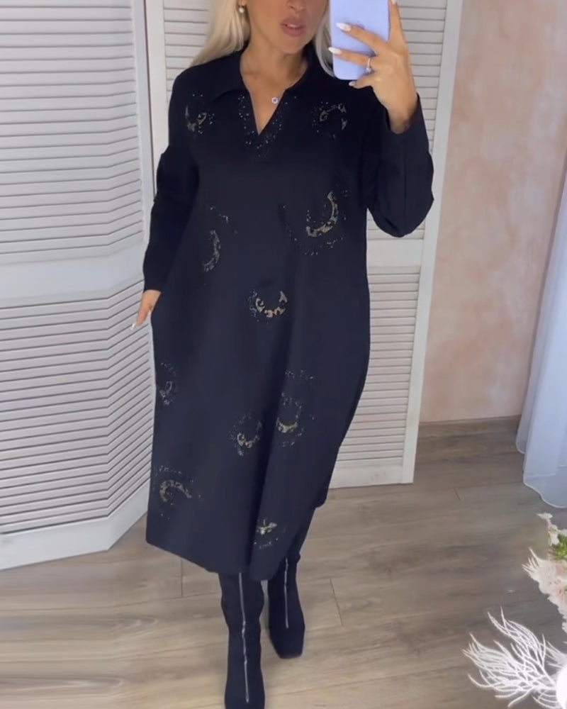 Långärmad midiklänning med slag