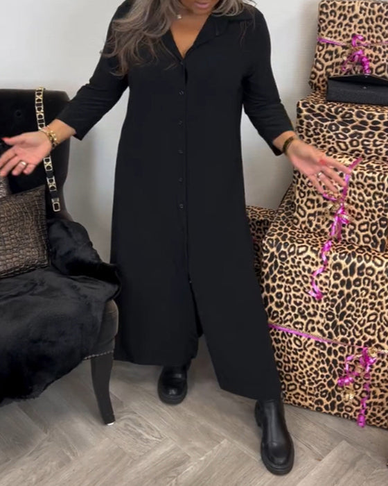 Klänning med knappar och V-ringning