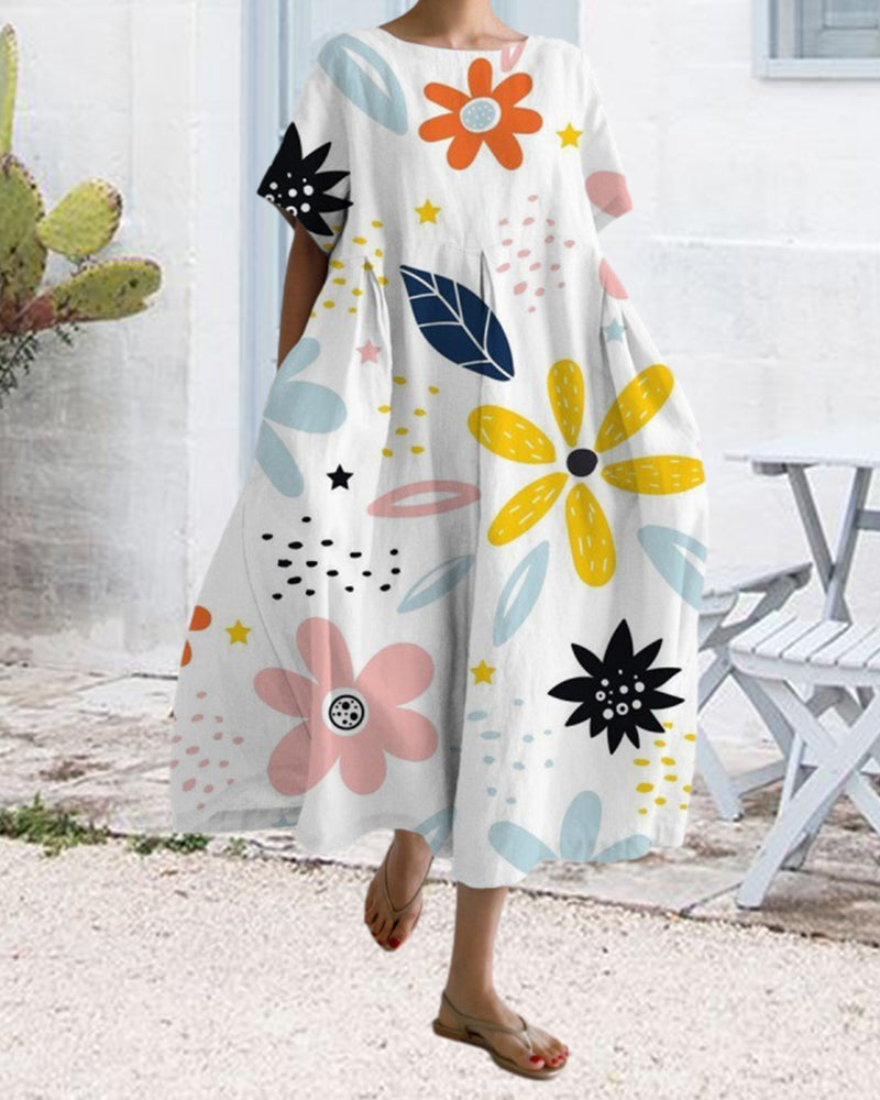 Lös kortärmad klänning med tryck