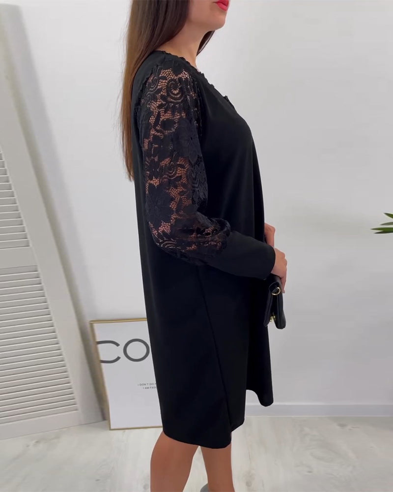 Elegant klänning med v-ringning och spets