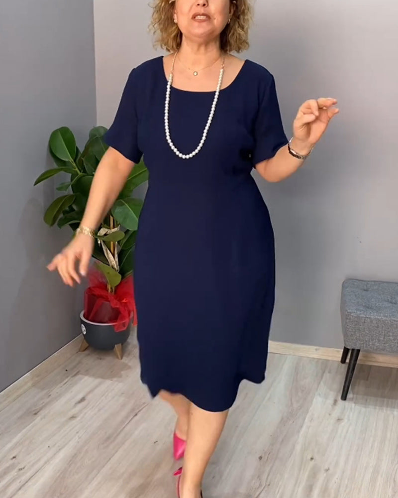 Enfärgad kortärmad elegant klänning