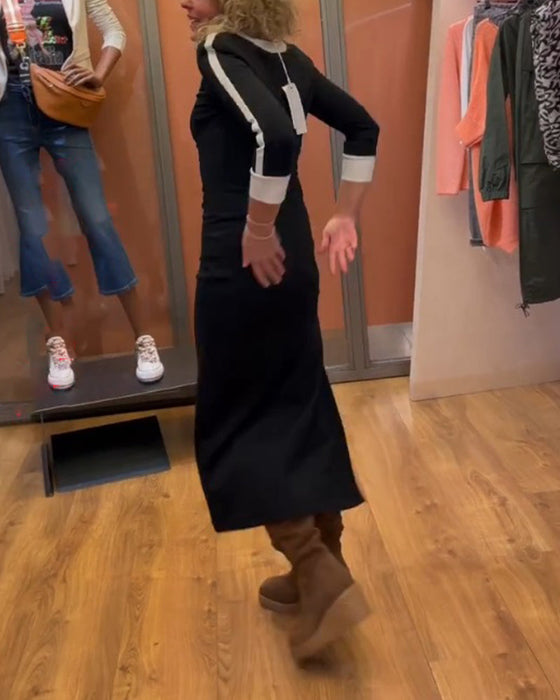 Klänning med V-ringning och 3/4-ärmar