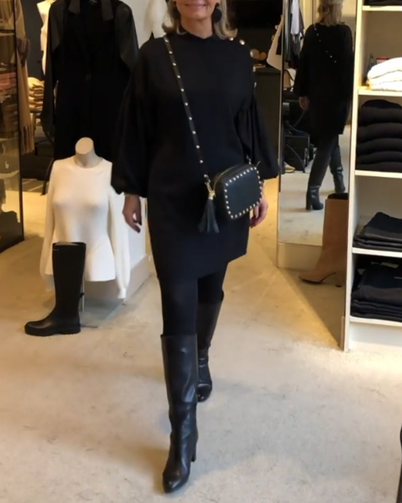 Klassisk svart klänning med lanternärmar